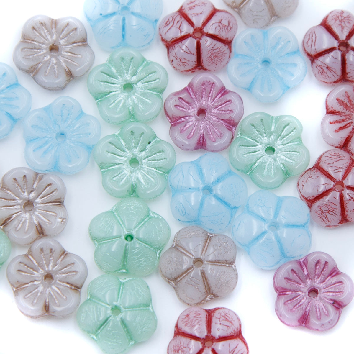 10FL525-3: CZ Flower Mix 10mm 25 Pieces