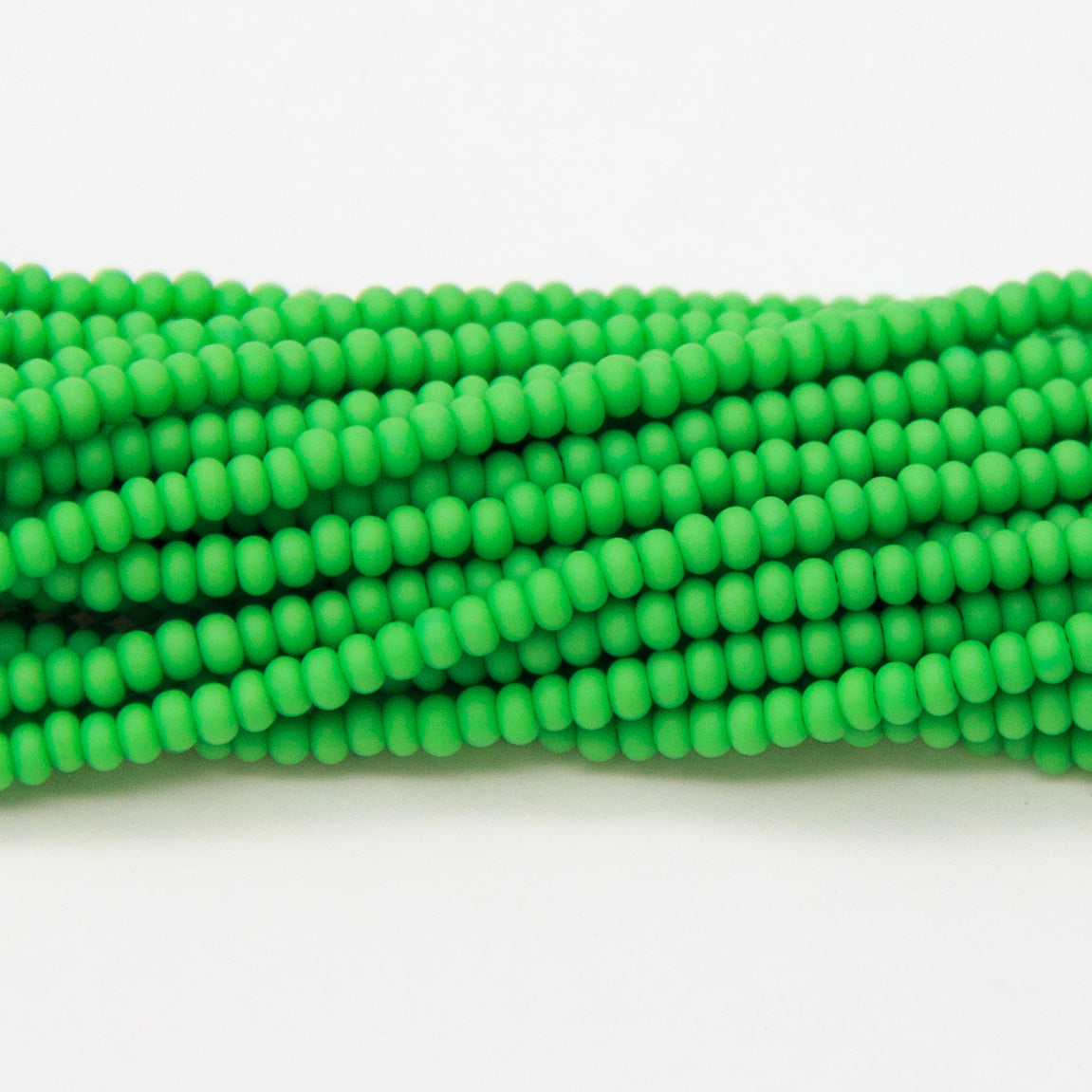 10SB182-MR: CZ Seed Bead Opaque LT Green Matte 10/0 1 Hank