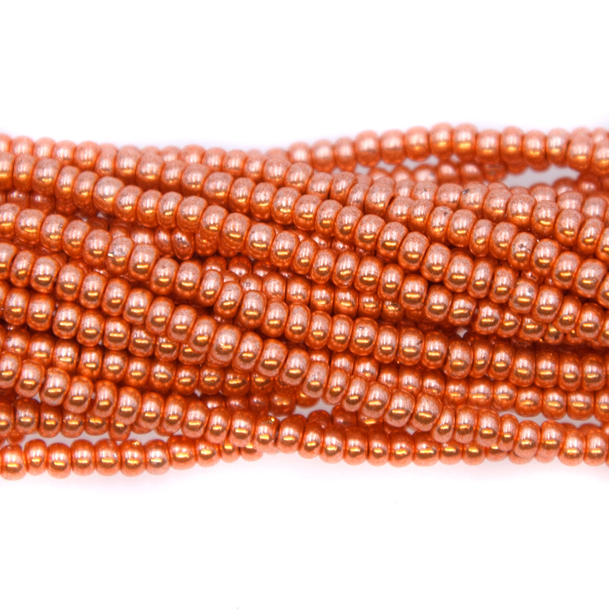 10SB856R: CZ Seed Bead Copper Full Coated 10/0 - 1HK