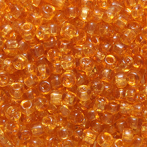 10SV254-3Q: Vintage Venetian Transparent Raw Sienna #3 SQ Hole 10/0 500 Grams