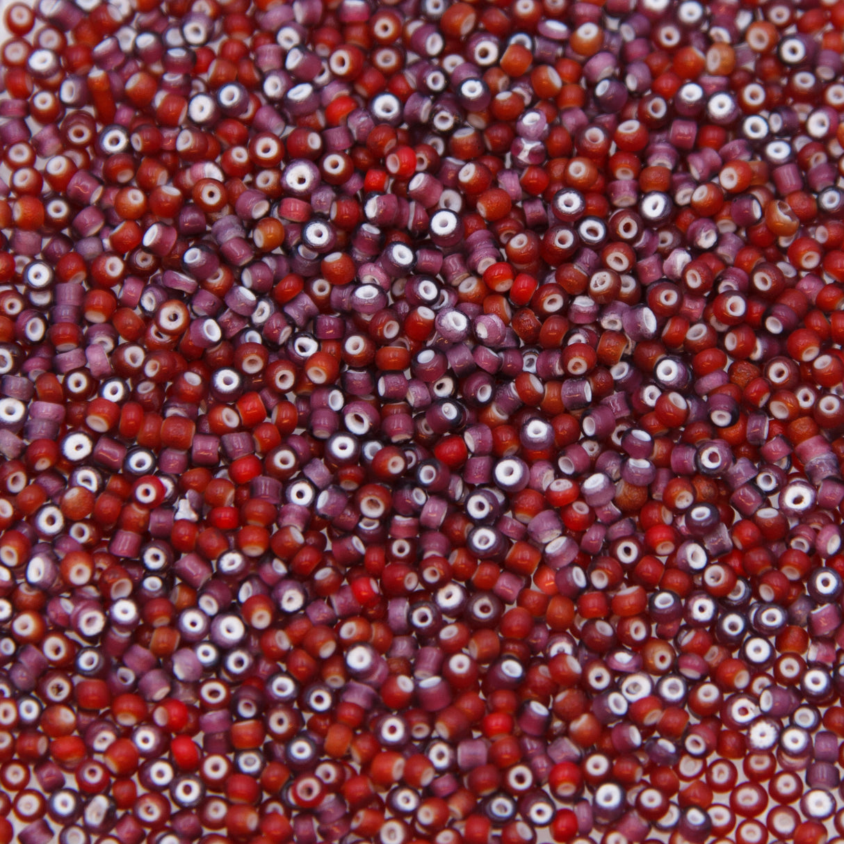 10SV7797: Vintage Amethyst and Red White Hearts 10/0 1 Oz Bags