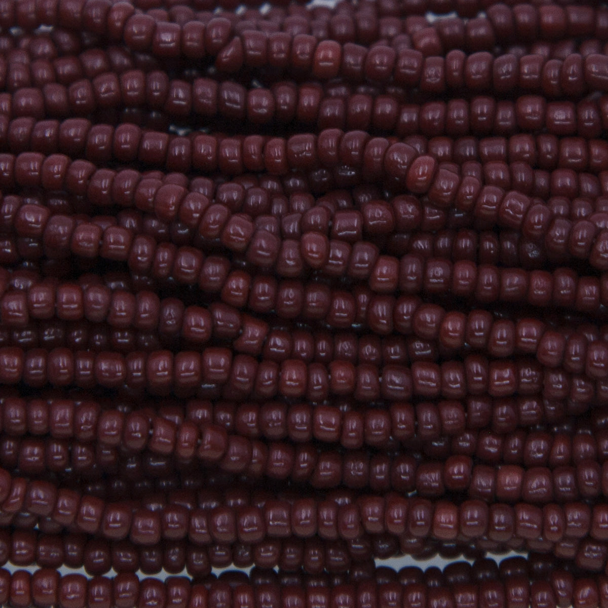 11SV100-50: Vintage Venetian Op Dark Maroon Red 11/0