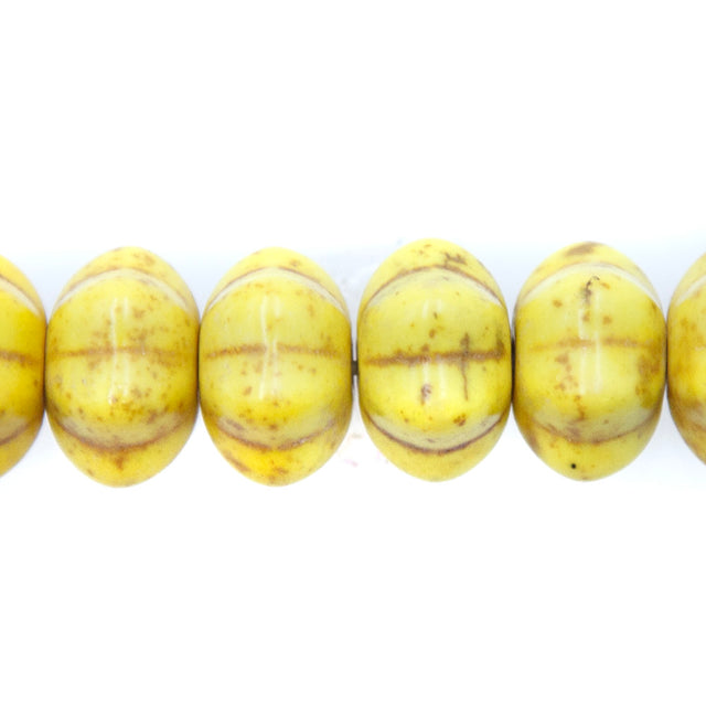 12ST612-Y: 12x7mm Yellow Magnesite Pumpkin Beads 15.5"