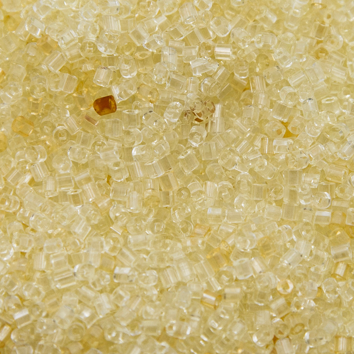 12SV100-11: Vintage Venetian Transparent Crystal/rust 12/0 250 Grams