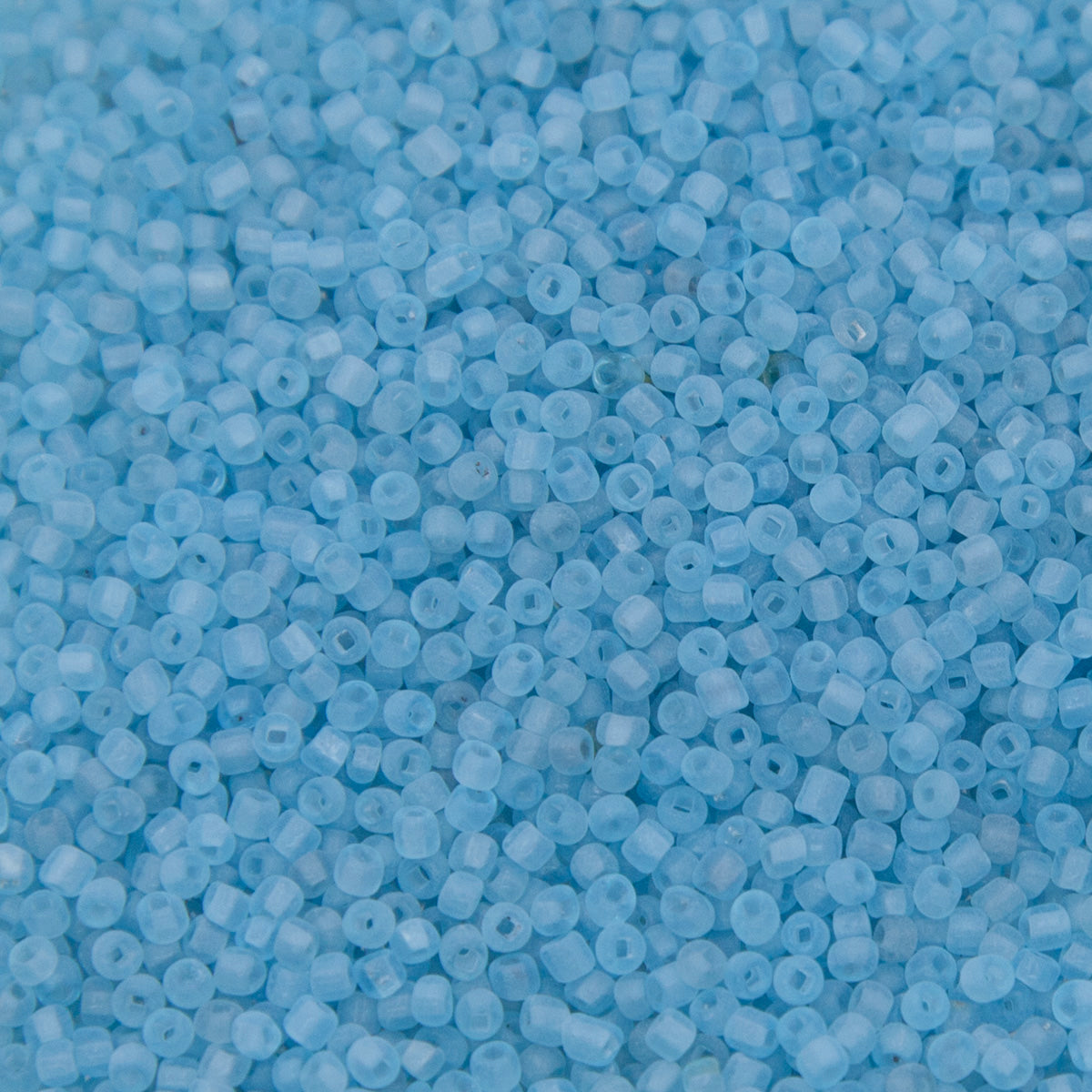 12SV100-38: Vintage Venetian Seed Bead Sq-H Tr Frosted Lt Blue 12/0