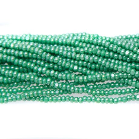 13SB384-C:  CZ Seed Bead Charlotte Sfinx Green 13/0 - 18HK