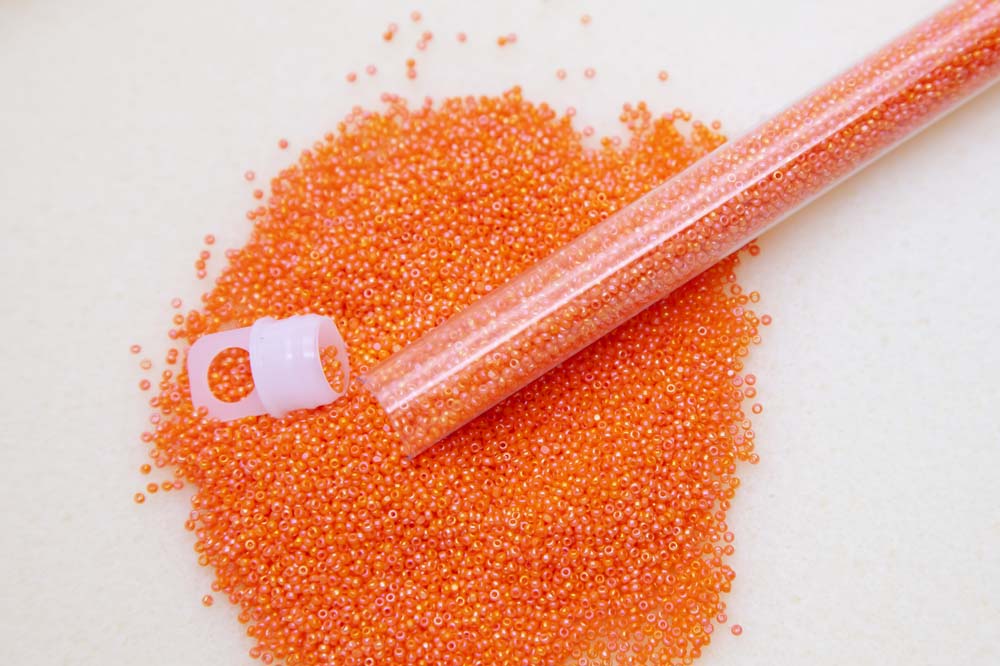 15SB534-CLR: CZ Seed Bead True Cut Orange AB 15/0 - 10GM