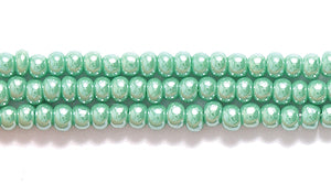 11SB384: CZ Seed Bead Sfinx Green 11/0 6HK
