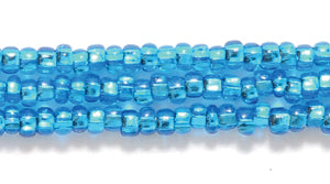 10SB466: CZ Seed Bead Silver Lined DK Aqua 10/0 5HK