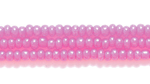11SB692-DY: CZ Seed Bead Dyed Pink On Alabaster 11/0 - 6HK