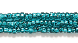 10SB487: CZ Seed Bead Silver Lined Emerald 10/0 5HK