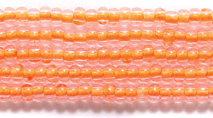 10SB734-N: CZ Seed Bead Neon Lined Orange Uv Reactive 10/0 - 5HK