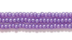 11SB698-DY: CZ Seed Bead Dyed Purple On Alabaster 11/0 6HK