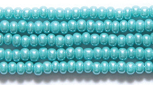 10SB385: CZ Seed Bead Sfinx Turquoise Green 10/0 5HK