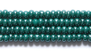 10SB386: CZ Seed Bead Sfinx DK Green 10/0 5HK