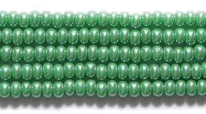 10SB382: CZ Seed Bead Sfinx LT Green 10/0 5HK