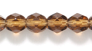 6FC257-3R: CZ FACET RD Trans DK Smoke Topaz 6mm 50PC