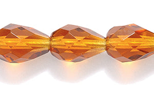 46FC256-1: CZ FC Drop TR MED DK Topaz 7x10mm 300PC