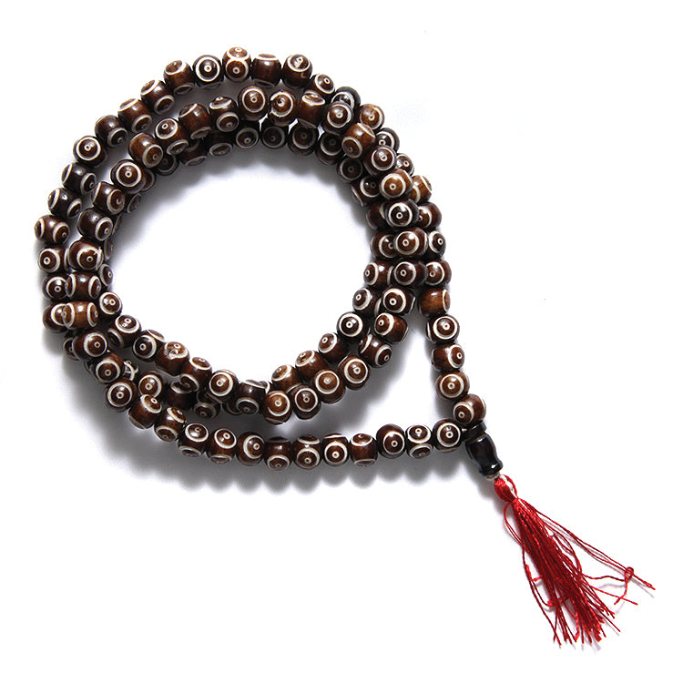 8BN158-MA3: Bone Mala DK BRWN/WHT Carve Round 8mm