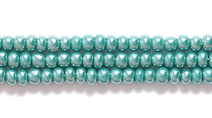 11SB386R: CZ Seed Bead Sfinx DK Green 11/0-1HK
