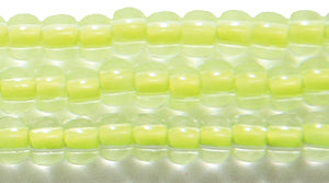 6SB723-NR: CZ Seed Bead Neon Lined Yellow 6/0 Uv Reactive-6STR