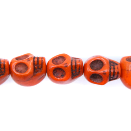 1ST50-O: Skull Magnesite Orange 10x12mm