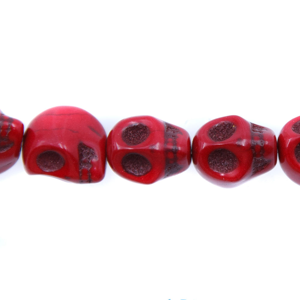 1ST50-R: 12x10mm Red Magnesite Skull Beads 15.5"