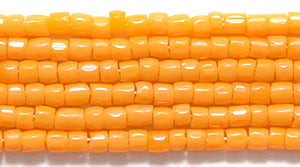9SC132: CZ Seed Bead 3-cut Opaque LT Orange 9/0 5HK