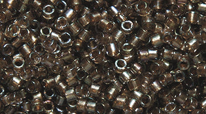 14SD7753R: DB2396 Delica Fancy Line Champagne 11/0 - 9GM