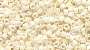 14SD551R: DB157 Delica Opaque Cream AB 11/0 - 9GM