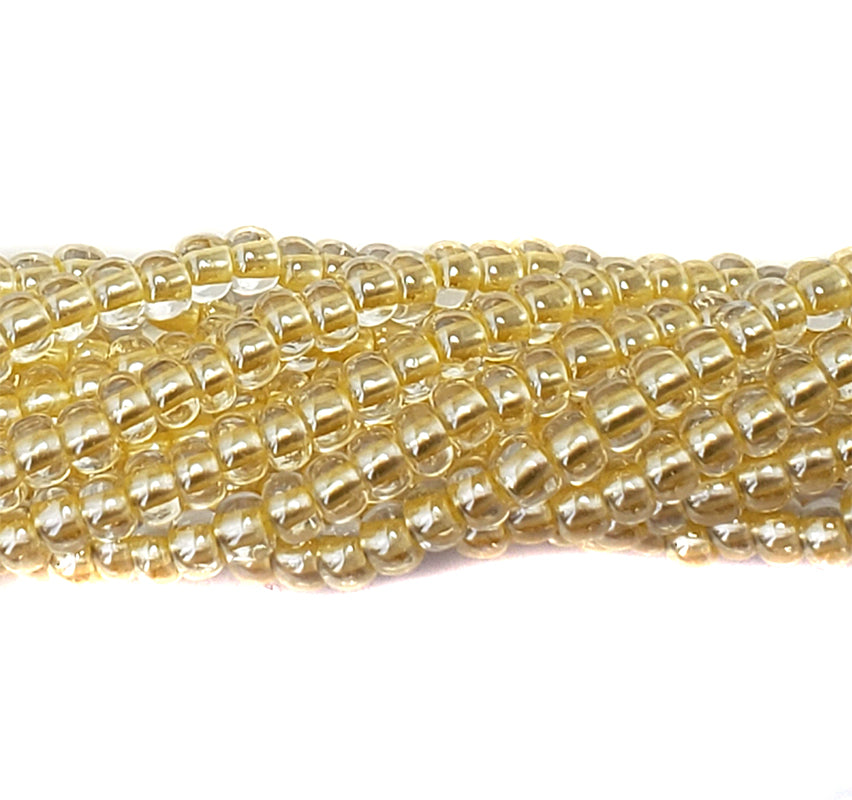 6SB622-LPR: CZ Seed Bead Pastel Pearl Lined Yellow #382PY 6/0-6STR