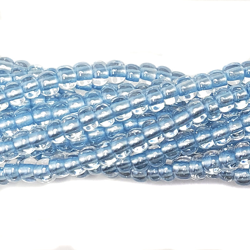 6SB672-LP: CZ Seed Bead Pastel Pearl Lined Sapphire 6/0 36STR