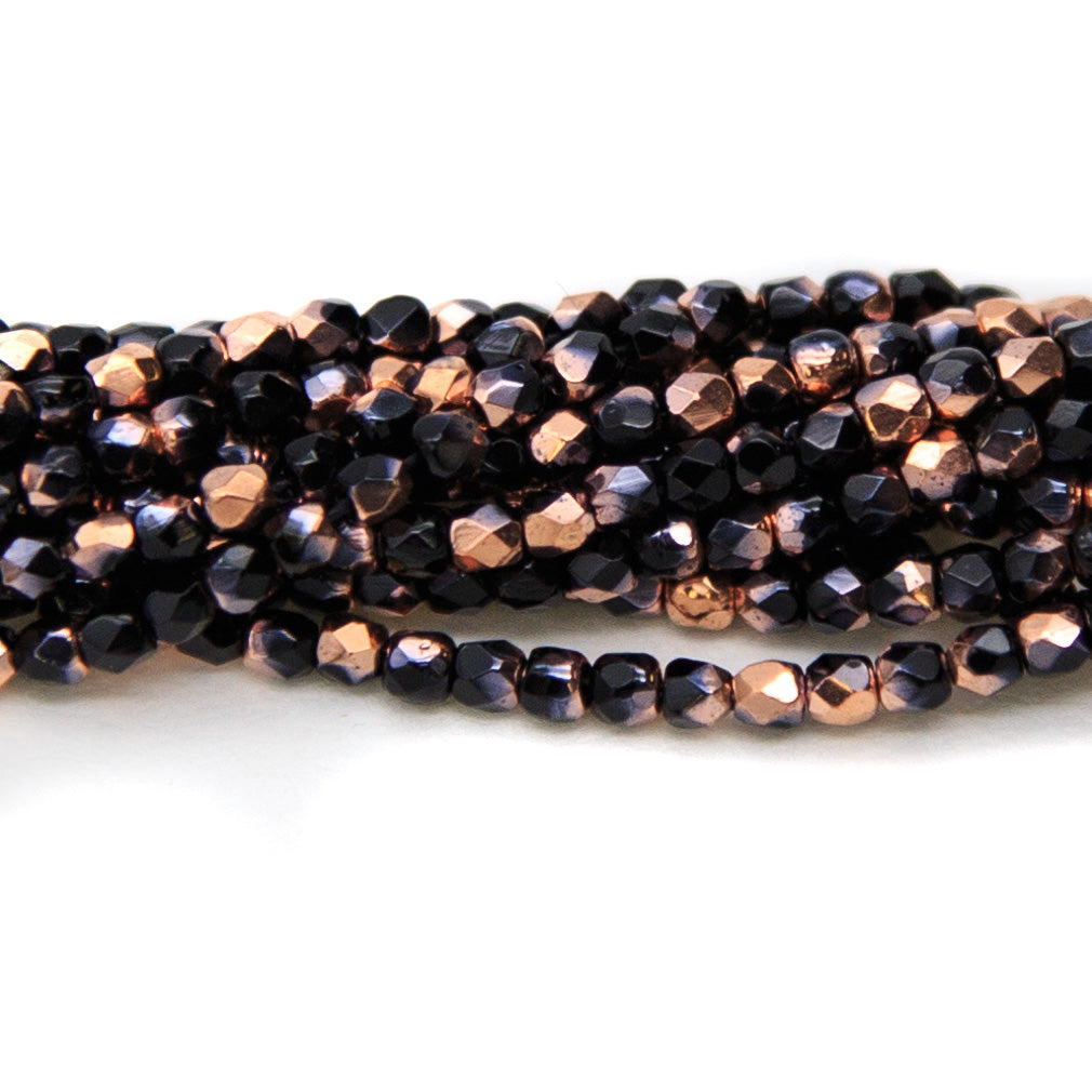 2FC109-HG: Czech Faceted Round Black w/Gold 2mm 600pc