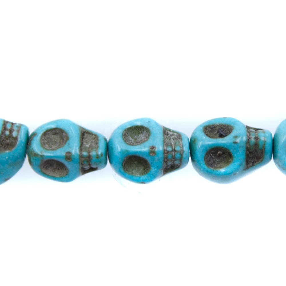 2ST50-B: Skull Magnesite Turquoise Blue 8x10mm