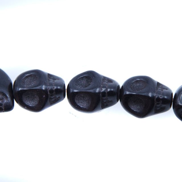 2ST50-BK: 10x8mm Black Magnesite Skull Beads 15.5"