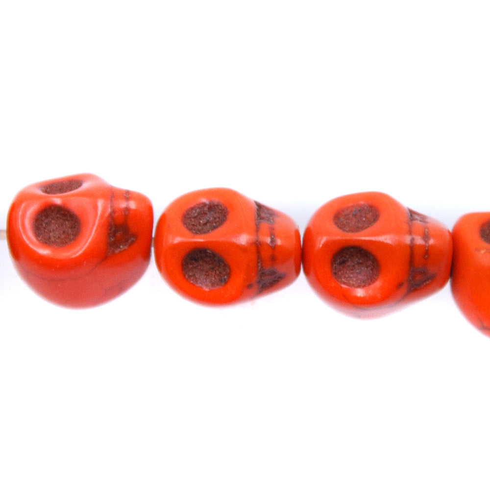 2ST50-O: 10x8mm Orange Magnesite Skull Beads 15.5"