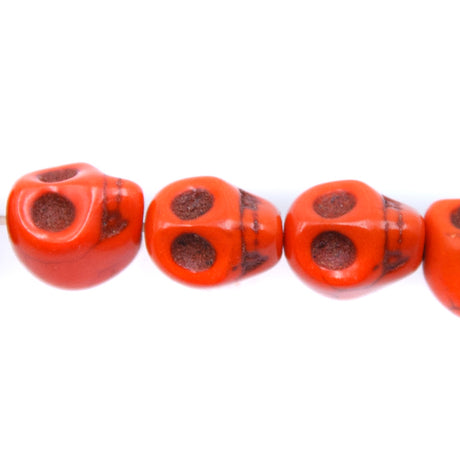 2ST50-O: 10x8mm Orange Magnesite Skull Beads 15.5"