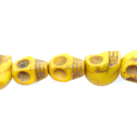 2ST50-Y: 10x8mm Yellow Magnesite Skull Beads 15.5"