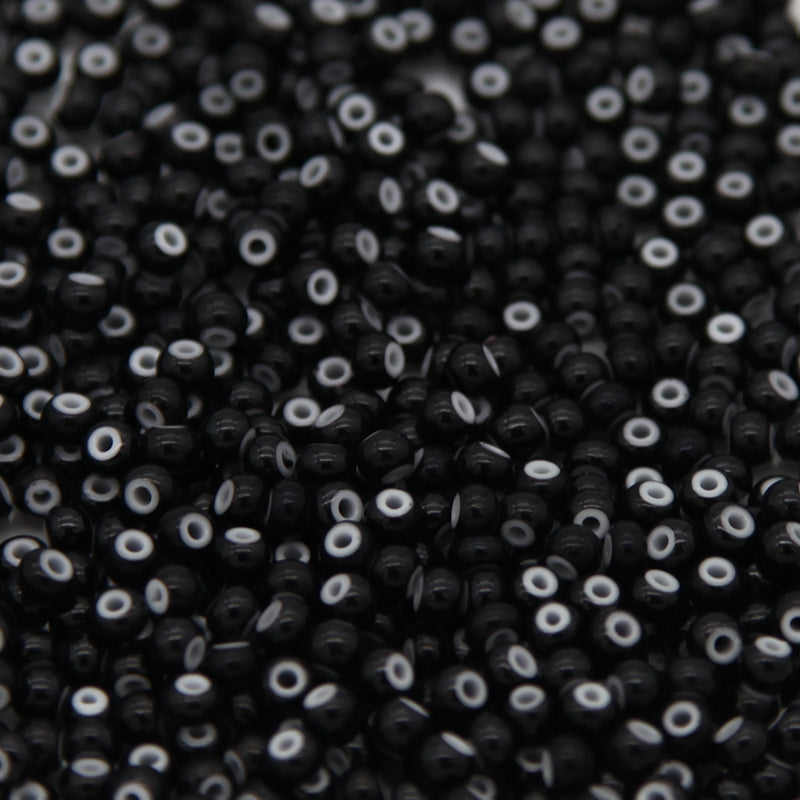 6SB109-WHL: CZ Seed Bead White Heart Black 6/0 50GM