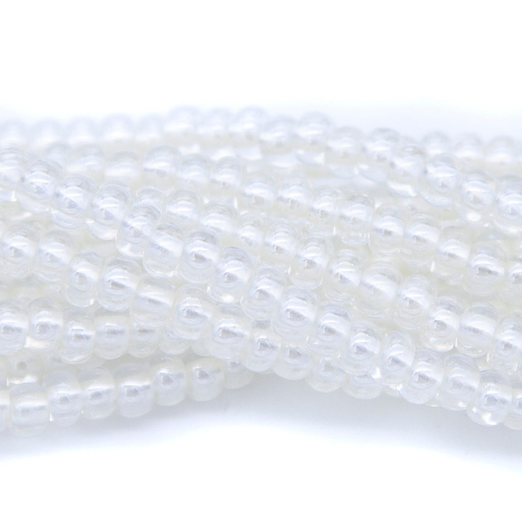6SB612-LP: CZ Seed Bead Pastel Pearl Lined White 6/0 36STR