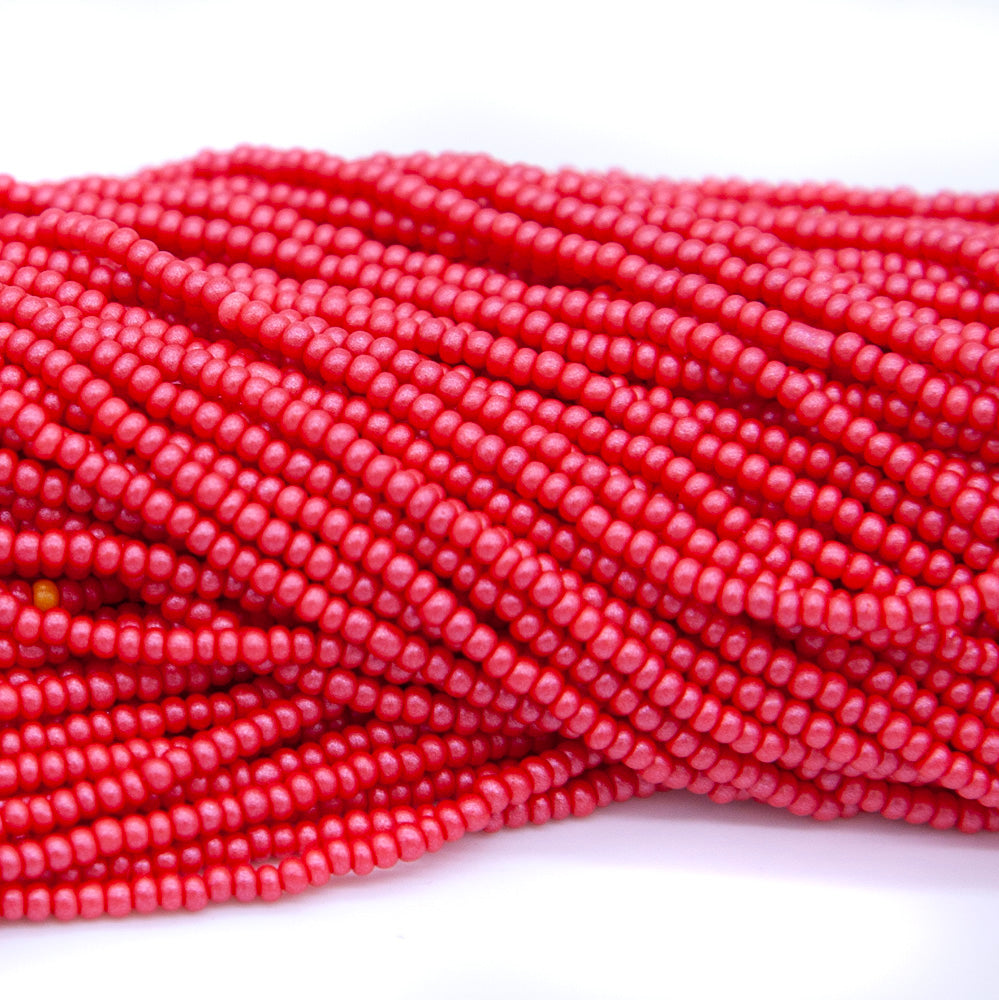 11SB943-PR: CZ Seed Bead Permalux Red 11/0 1HK
