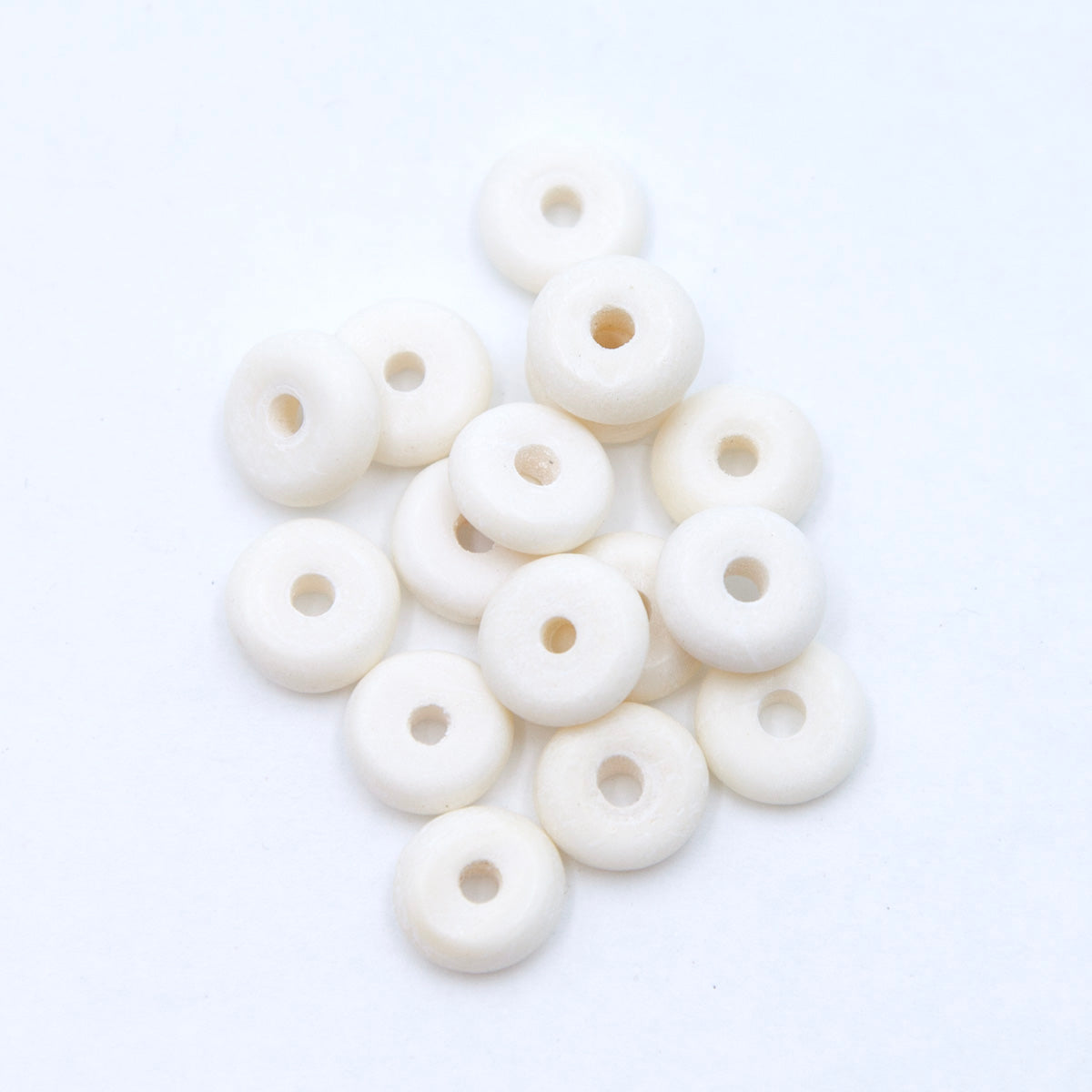 40BN114: Bone Disc White 3x9mm 100 Pieces