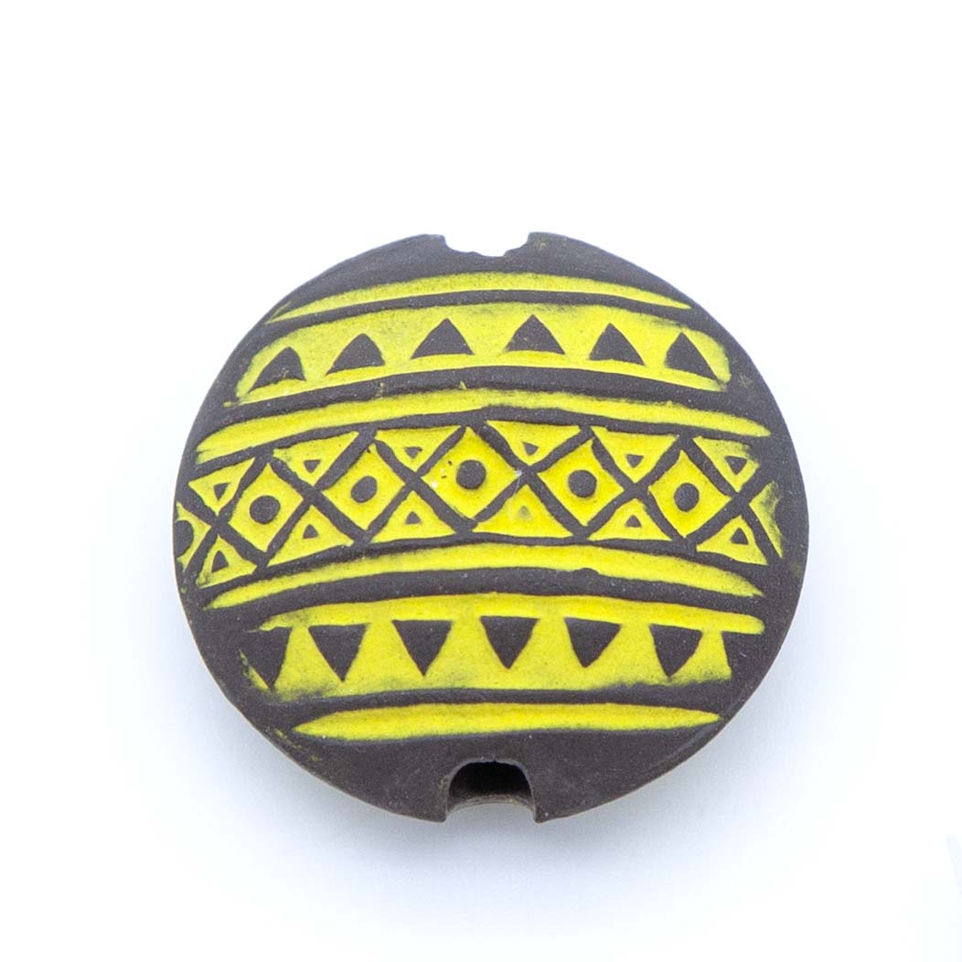 CI2039-DM: Stoneware Lentil Tribal Pattern Yellow on Dark 23.5mm