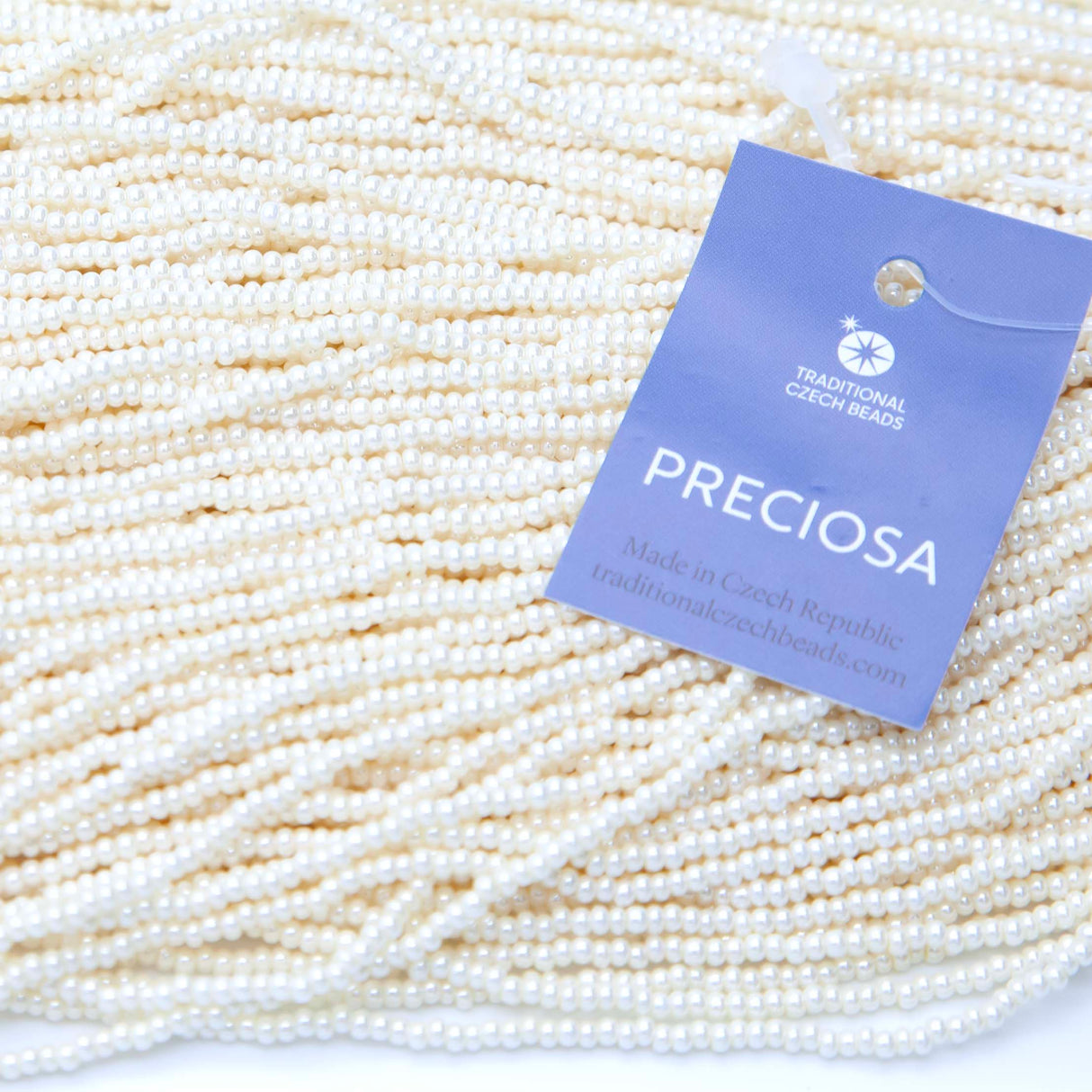 10SB651: CZ Seed Bead Pearl LT Eggshell 10/0 5HK