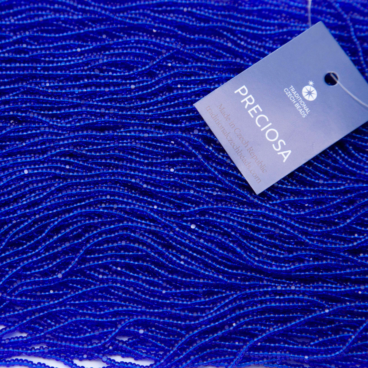 11SB268-C: CZ Seed Bead True Cut TR Capri Blue 11/0