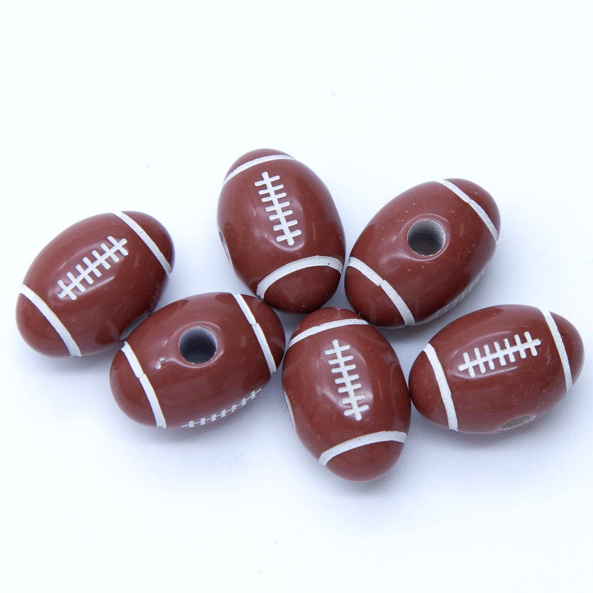 PL204R: Acrylic Football/Rugby Ball 12x19mm 60Pcs