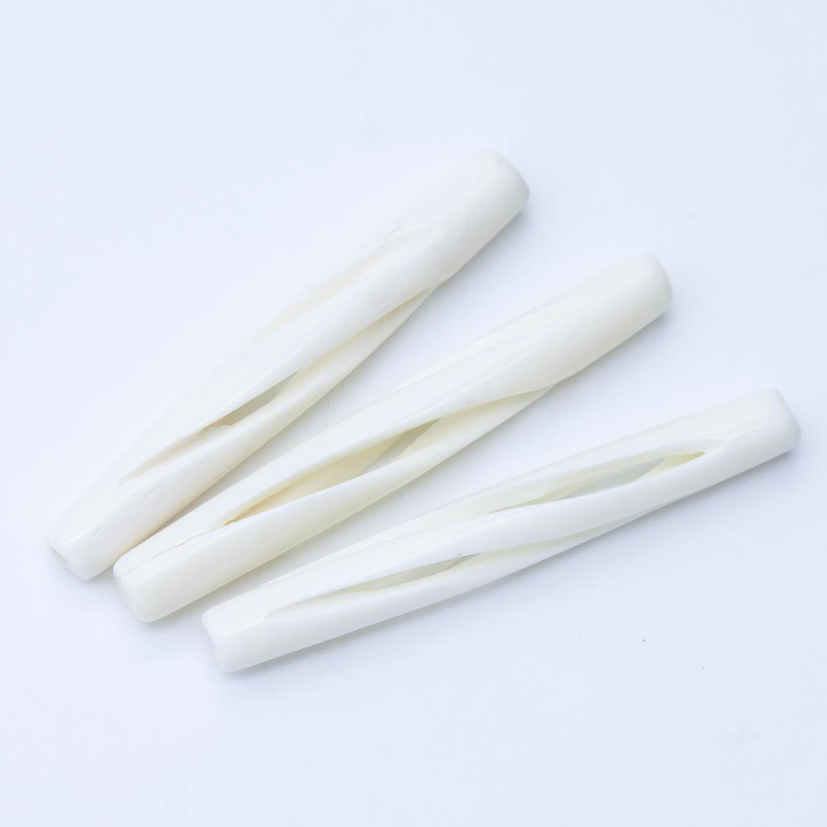 48IP114-SE: Bone Pipe 2 In Carved Swirl Economy 25 Pc