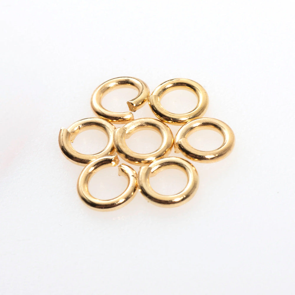 4FI206-G: Jump Ring 5mm 18GA GLD PLT - 55PC/5GM