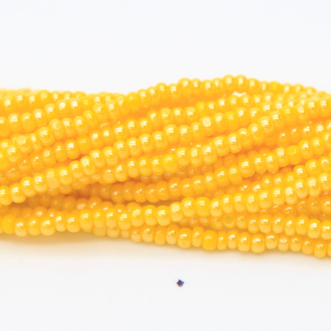 11SB326-C: Czech Seed Bead True Cut Sfinx Dark Yellow 11/0 6 Hanks