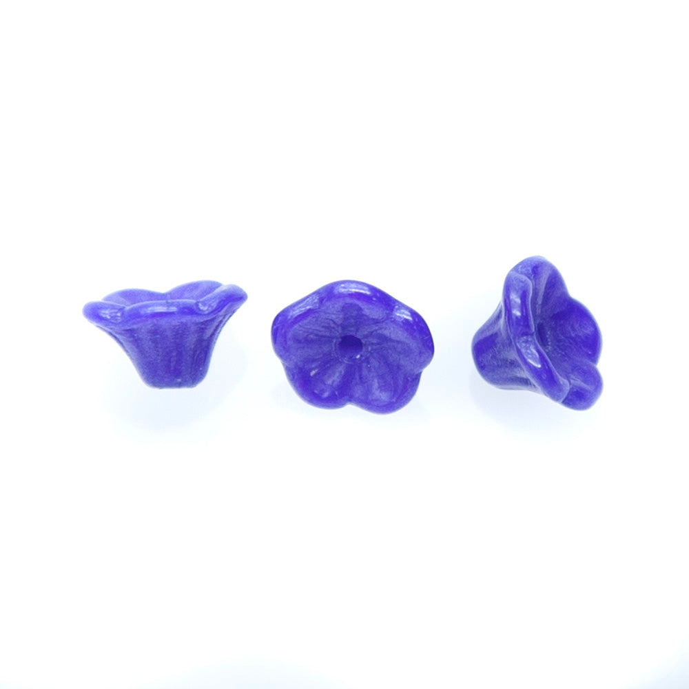57FL374: CZ Flower Blue Luster 5x7mm 25 Pieces